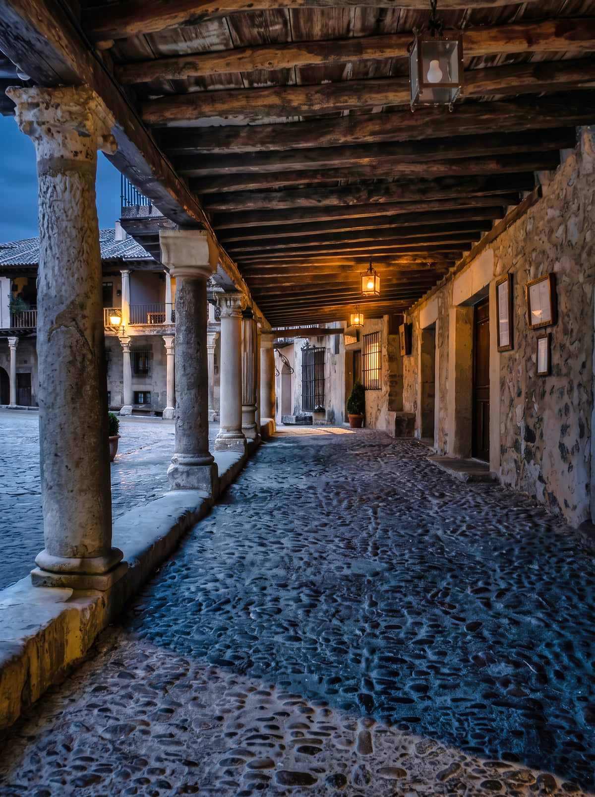Beneath the Timbered Portico